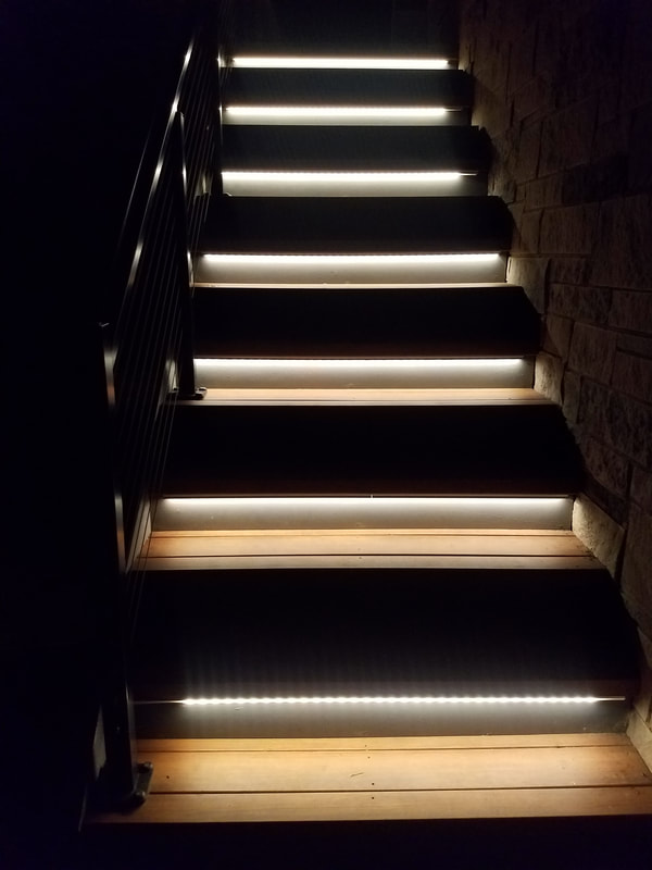 closeup of staircase with lighting